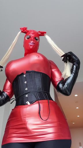 Sissy bimbo fucktoy in red waiting to service cocks