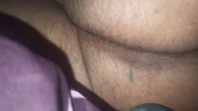 Masturbating