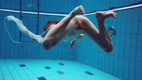 Scorching hot blonde nympho gets totally nude and wet beneath the waves with Diana Zelenkina