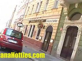 She shows her naked body at the public street