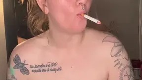 Smoking and disrobing, chubby babe's tease
