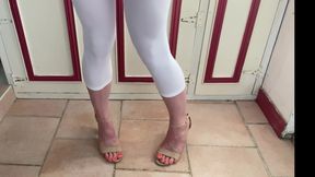 Long pee in heels and white capri tights