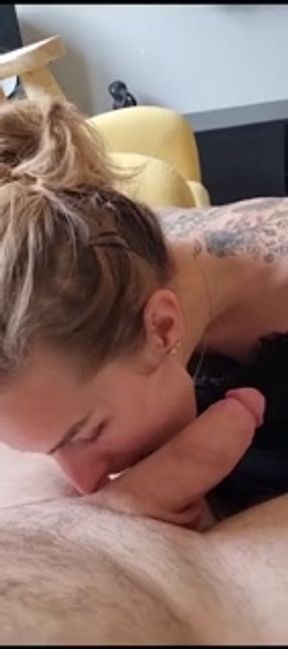 she jerks me off with her little tits to make me cum while watching a porn movie