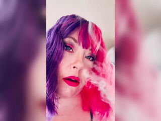 Chubby Cougar Tina Snua Smokes A Cork Tipped Cigarette In Latex Gloves -