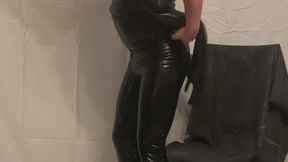 Sliding into a Tight Zipperless Black Catsuit with Attached Feet, Hood and Gloves