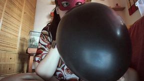 black latex shine: nicoletta’s sensual game with the giant black balloon