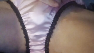 Close-up fetish video of American crossdresser stroking his cock in lingerie and panties before explosive cumshot