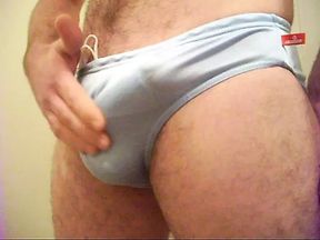 Rubbing my bulge and cum in my aussiebum speedo briefs.