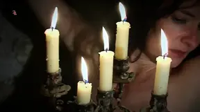 Gypsy witch's natural big tits on display as she's tormented by hot wax