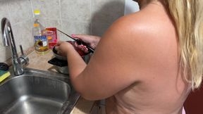 Zara cooks naked in the kitchen