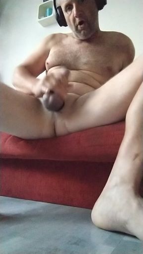 Handjob of a tied dick