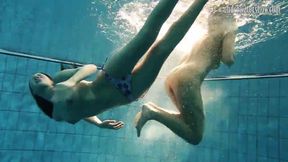 Underwater wet teases as babes Andrea and Monica strip each other's nubile bodies.