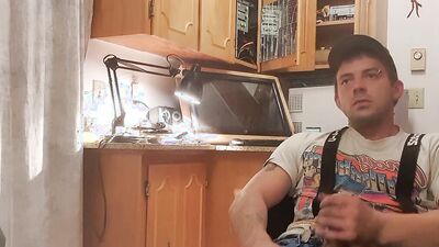 Amateur hunk pulls his cock out of his jeans and jerks off