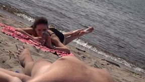 Beachside booty call: amateur exhibitionist shares teensy weensy willy with sun-kissed crowd.