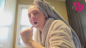 Brushing Teeth with Hair in Towel