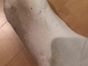 Klaarkomen over witte Puma sok