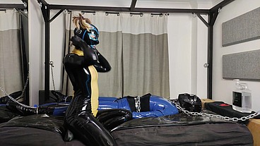 Shiny latex behind the scenes with faeriewillow as she and my Owner threaten to leave me chained up while they clean up after...