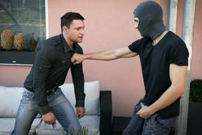 The thief is having his way with the man of the house