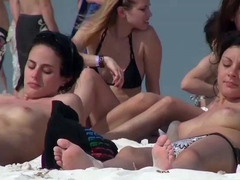 Beautiful breasts at a nudist beach