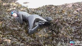 Rubbery Beach Encounter: Lucy's Neoprene Pussy Play with Stranger
