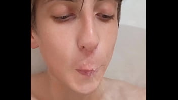 I take a shower and shave my big tattooed dick and also masturbate my hole anal with a shower head. And I cum twice.