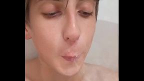 I take a shower and shave my big tattooed dick and also masturbate my hole anal with a shower head. And I cum twice.
