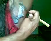 Anonymous raven-haired whore shaves her hairy armpits