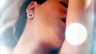 Tattooed Brazilian Mila Spook teases herself in a sunlit bedroom