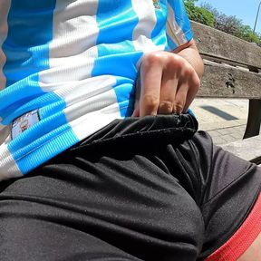 Bulging young man moans with pleasure in a public park jerking off a summer handjob