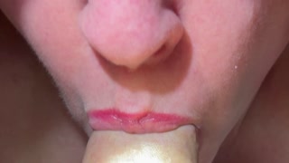 Sucking his cook whit red lips and a flashlight