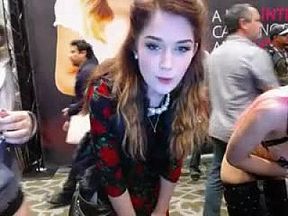 Provocative redhead beauty shows off her big boobs in a pub 05