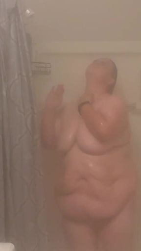 Stunning moment from &quot;Fat bitch takes steaming hot shower and plays with herself&quot;