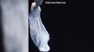 Aqua women Andrejka underwater stripping and swimming