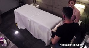 Milking cock under the table during massage