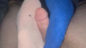 Sockjob turns into footjob