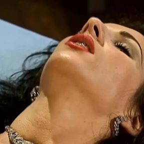 A sexy German lady with dark hair gets her holes fucked and fisted