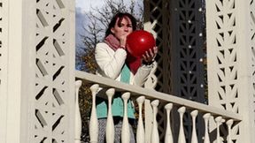 Blow and pop balloons in the gazebo