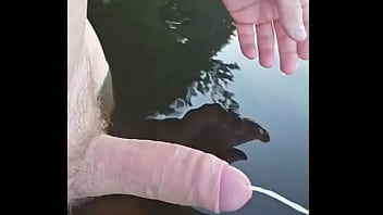 Failed extreme edging ending in cumshot in lake