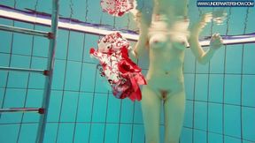 Hot Polish redhead swimming in the pool