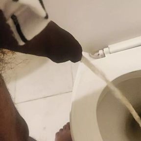 Indian black dick men peeing in the toilet