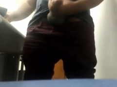 Brazilian Daddy Strokes His Big Uncut Cock at Work