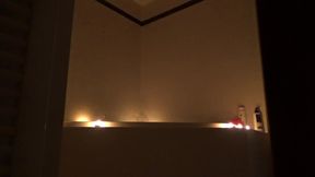 All-natural petite teen enjoys bathtub fantasy with candles