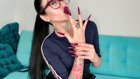 Dark purple long nails, claws, long flexible fingers and dark lipstick