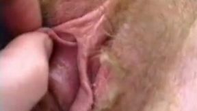 Stretching pussy lips of my German girlfriend playing with her hairy pussy