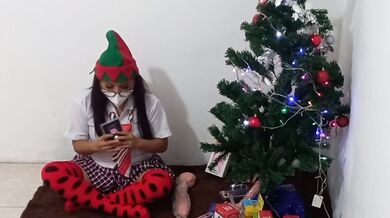 Hot milf alone in bedroom fists and rubs her soaked pussy after opening Christmas goodies