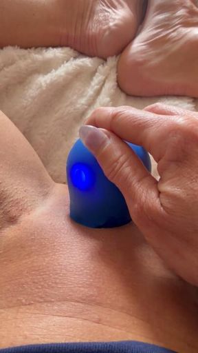 Rose toy on a smooth pussy