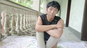 A handsome Asian boy masturbates, moaning, ejaculating, and consuming fluids in an abandoned hotel corridor