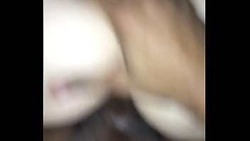 Young wife riding a bull