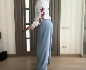 Palazzo wide leg flared blue jeans and white hoodie with roses print on tranny crossdresser femboy