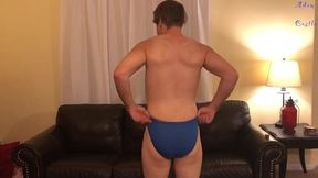oiled stud does workout in man-thong